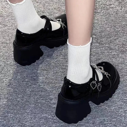 Black Shoes with Heart-Shaped Details