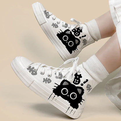 Adorable black and white cat-themed high-tops.