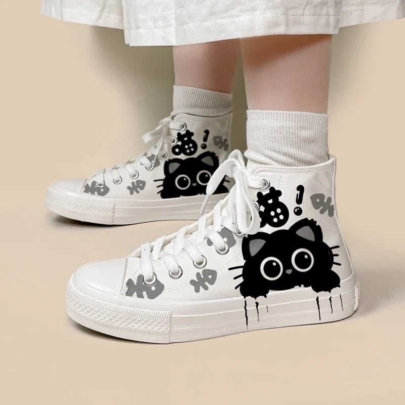 Adorable black and white cat-themed high-tops.